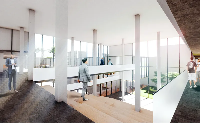 Transparent circulation spaces and interconnected levels create a dynamic educational environment focused on openness and collaboration.
