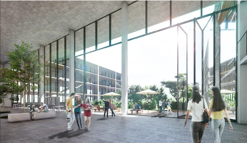 Double-height gathering spaces blur the boundaries between indoor and outdoor learning while strengthening social interaction within the campus.
