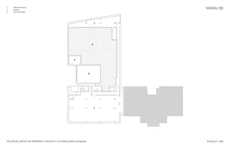 Basement level floor plan drawing showing a large hatched hall space and adjacent service rooms
