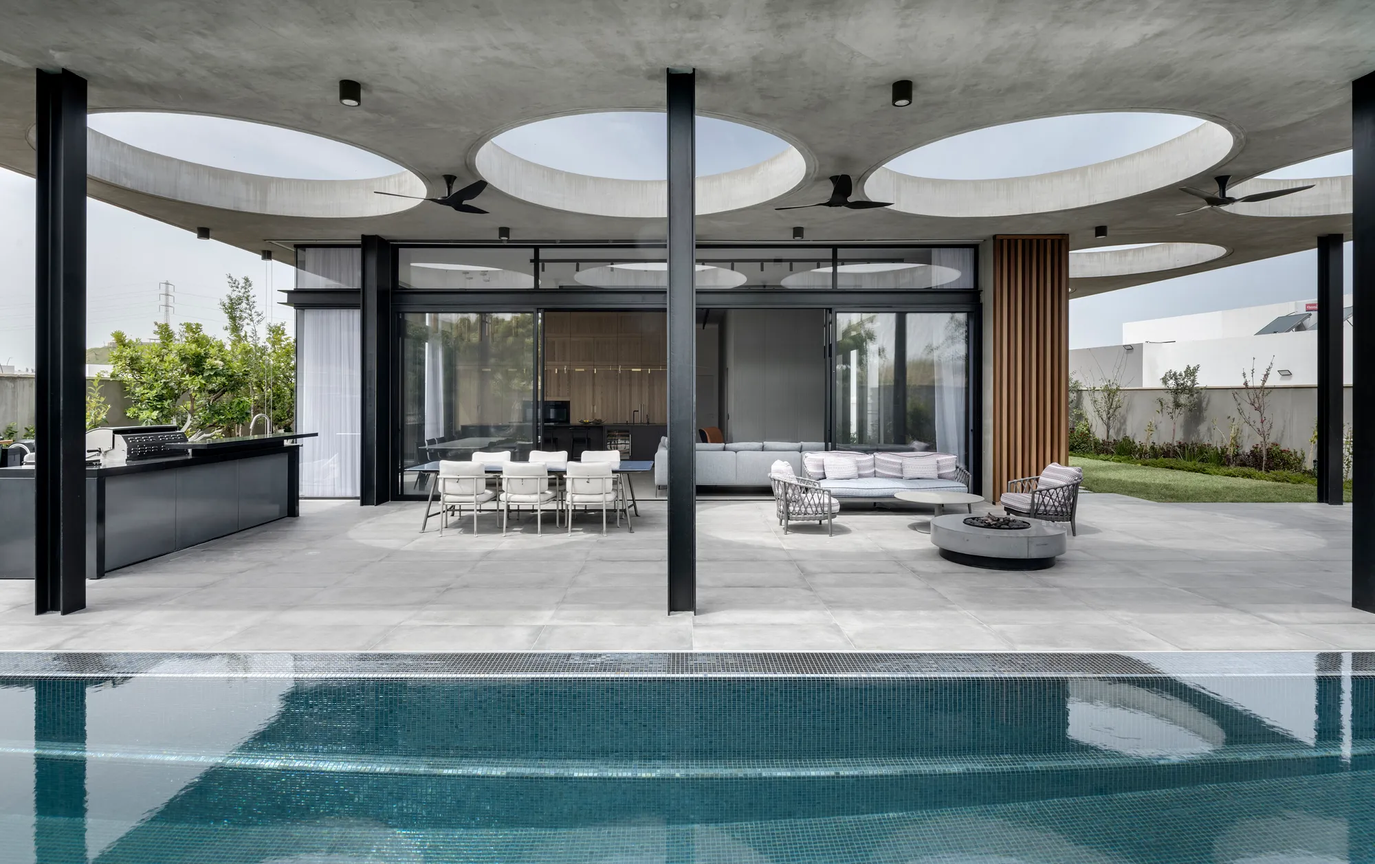 Dan and Hila Israelevitz Lay a Concrete and Timber House into an Israeli Hillside