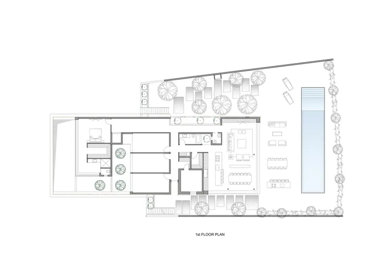 First floor plan showing central stair hall with living spaces and pool terrace