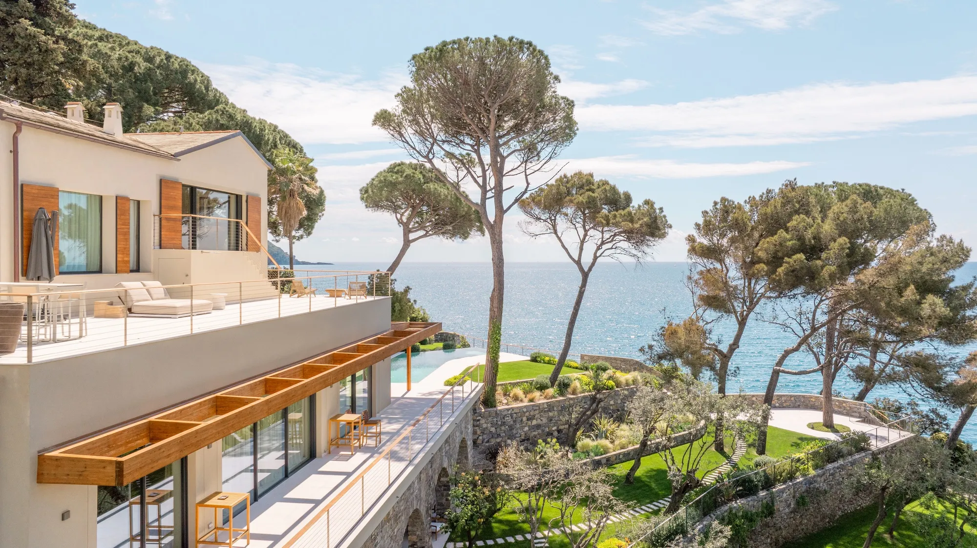 Four Studios Weave a Ligurian Villa into the Cliff That Survived the Bombing of Recco