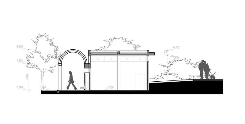 Section drawing showing an arched entry portal leading into a covered space with a person walking