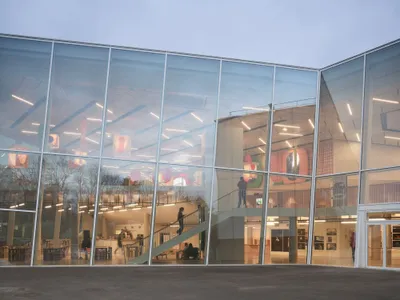 Snøhetta Turns a Brutalist Theater Outside Paris into a Glowing Urban Lantern