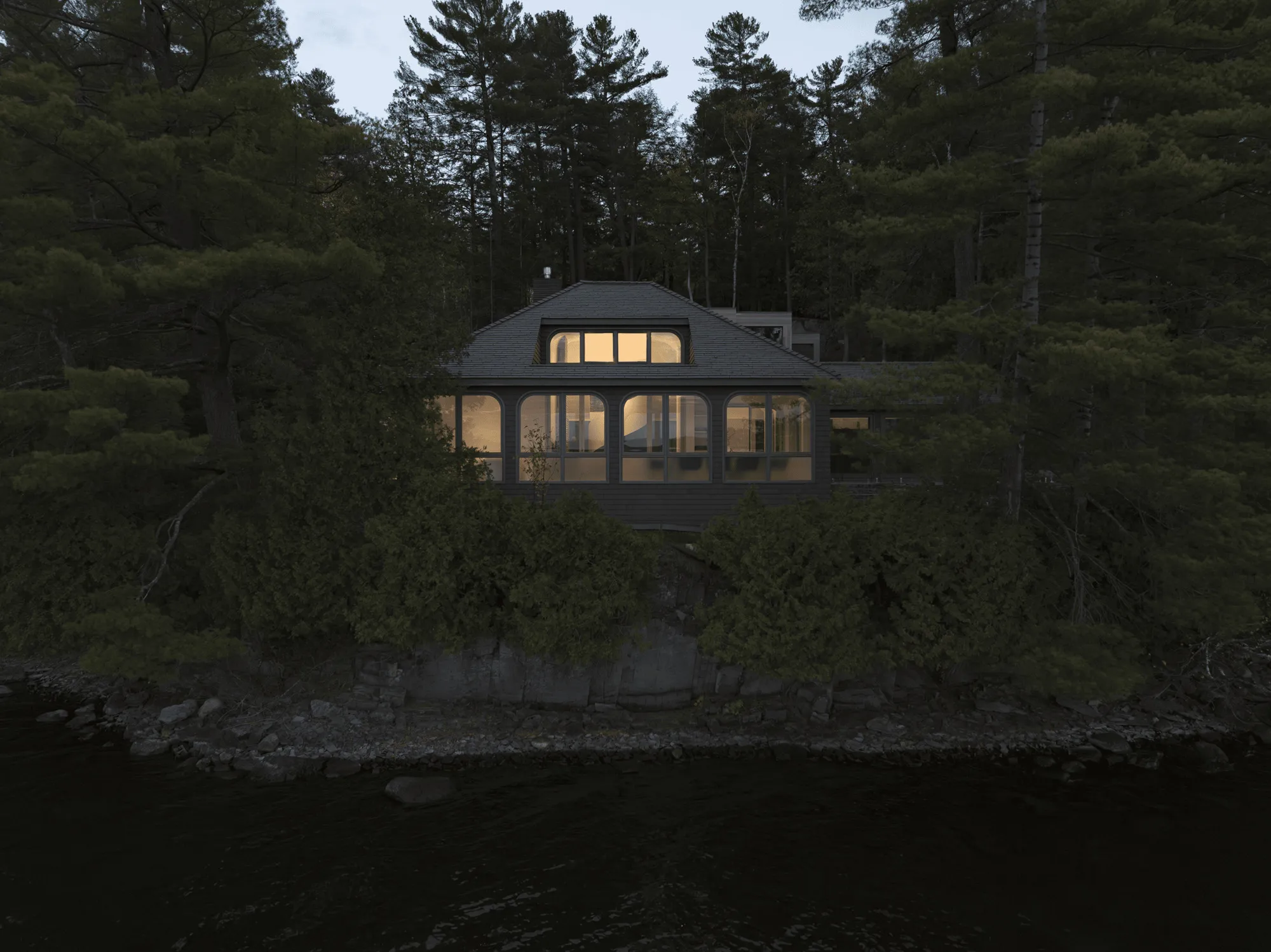YH2 Architecture Stretches a Lake Cottage into Two Cedar Pavilions Linked by a Glass Walkway