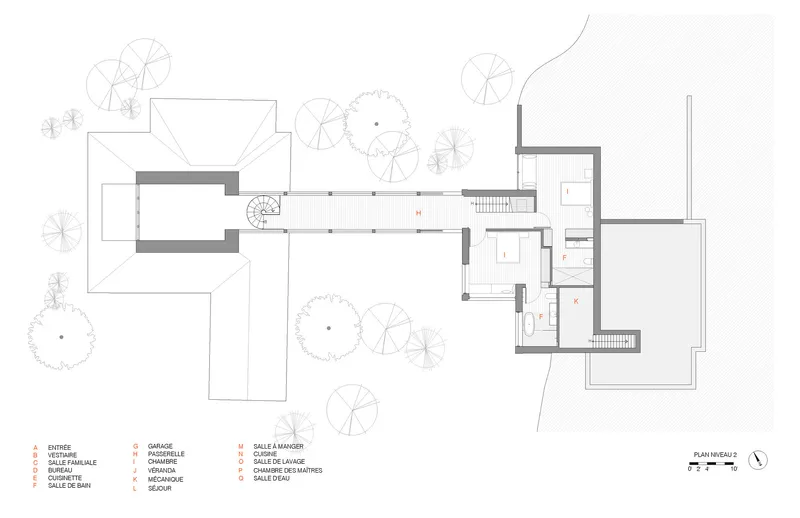 Upper floor plan drawing showing bedrooms and circulation connecting to the adjacent structure