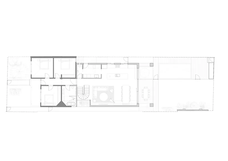 Floor plan drawing showing a linear layout with bedrooms, bathrooms, circular stair, and living spaces with terrace