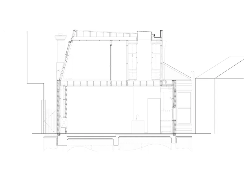 Building section drawing showing timber frame construction, roof structure, and ceiling joists with existing building to left