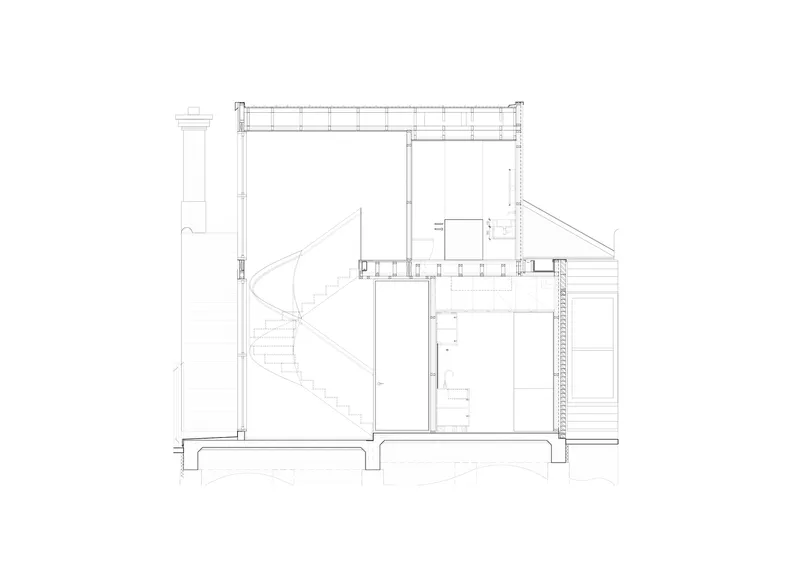 Building section drawing showing curved stair, timber frame walls, and sloped ceiling with roof structure above