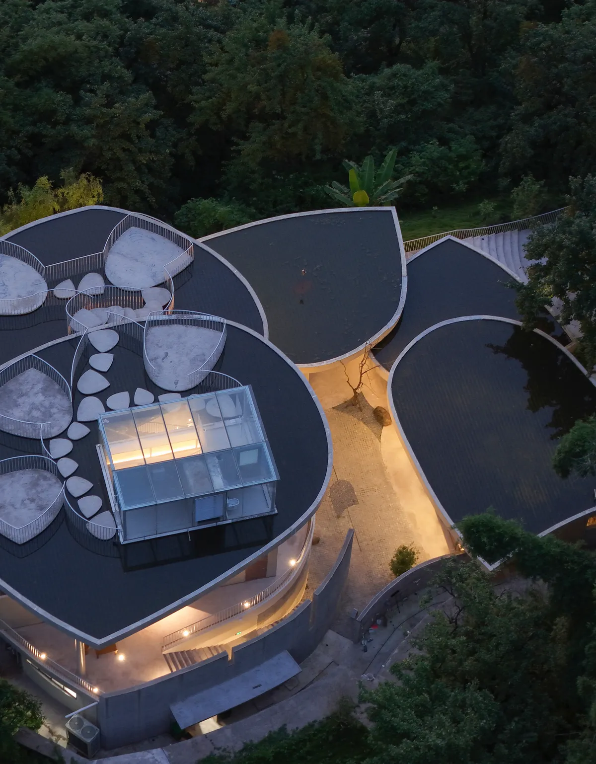 Archermit Scatters Five Concrete Petals Across a Chinese Hillside to Form the Feixue Pavilion