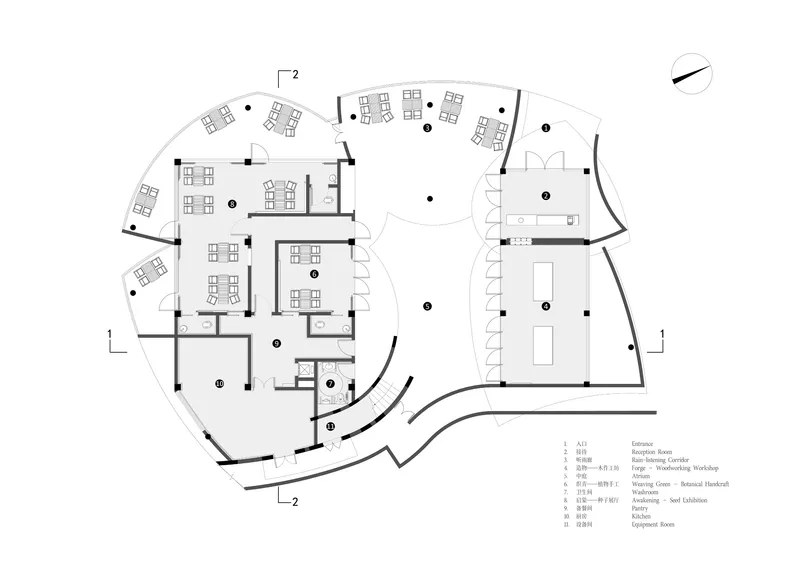 Floor plan drawing showing curved volumes with dining areas and service zones
