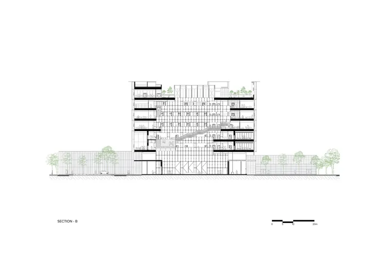 Section drawing showing interior spaces with a grand staircase and surrounding trees