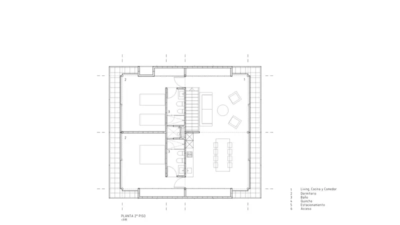Floor plan drawing showing an open living and dining area with central staircase and perimeter circulation