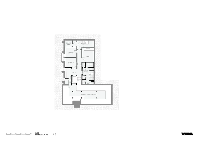 Basement floor plan drawing showing court area, storage spaces and corridor circulation with an outdoor terrace