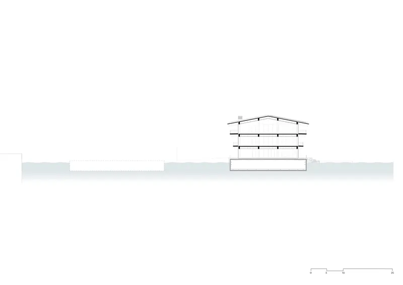 Section drawing revealing three-level structure with gabled roof set into sloping terrain