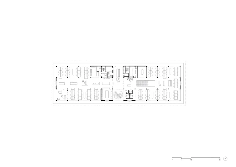 Upper floor plan drawing depicting open-plan workspace with central circular feature and perimeter offices