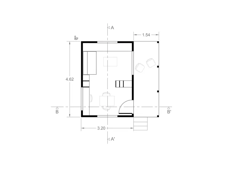 Floor plan drawing showing a compact rectangular layout with kitchen, dining area and stair