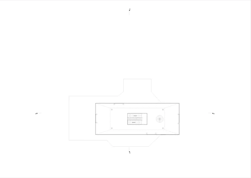 Site plan drawing showing a rectangular volume with central courtyard and entrance tower
