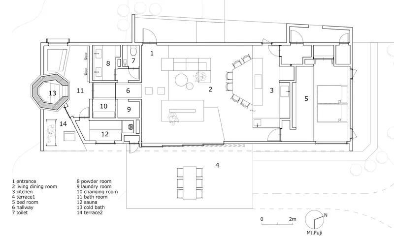 Floor plan drawing showing open living areas with octagonal bath and labeled rooms