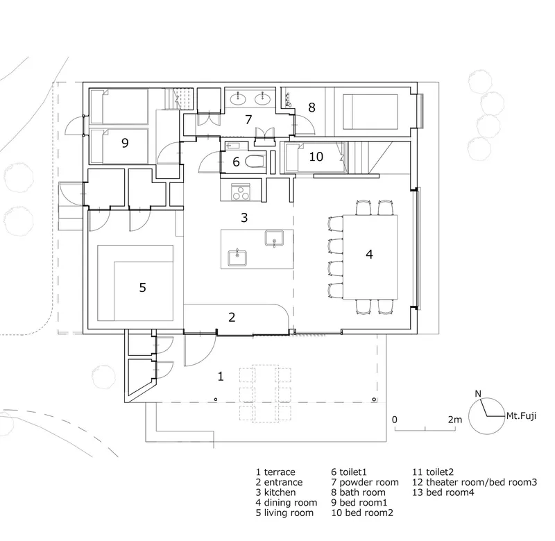 Floor plan drawing showing the main level with kitchen, dining room, living room and three bedrooms