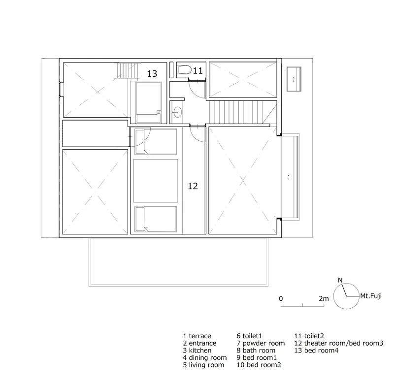 Upper floor plan drawing showing two bedrooms and a theater room with stairs
