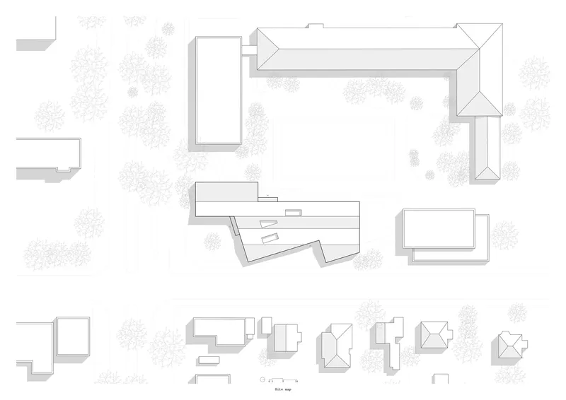 Roof plan drawing depicting L-shaped volumes arranged around a central courtyard with scattered tree symbols