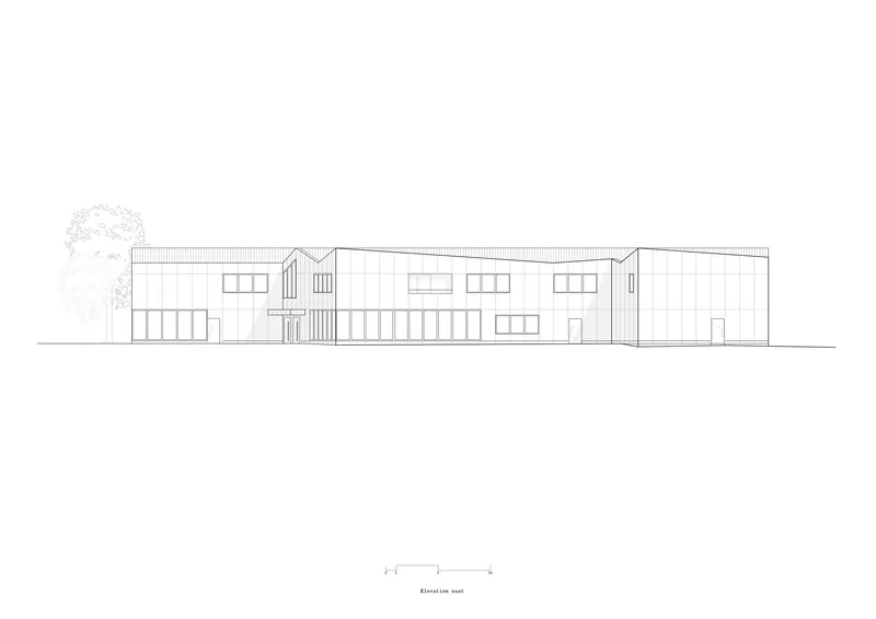 Elevation drawing of east facade with varied window openings and angled roof peaks