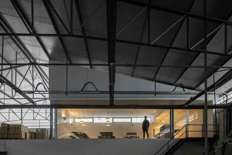 Visual connection between canteen and factory through glass partition