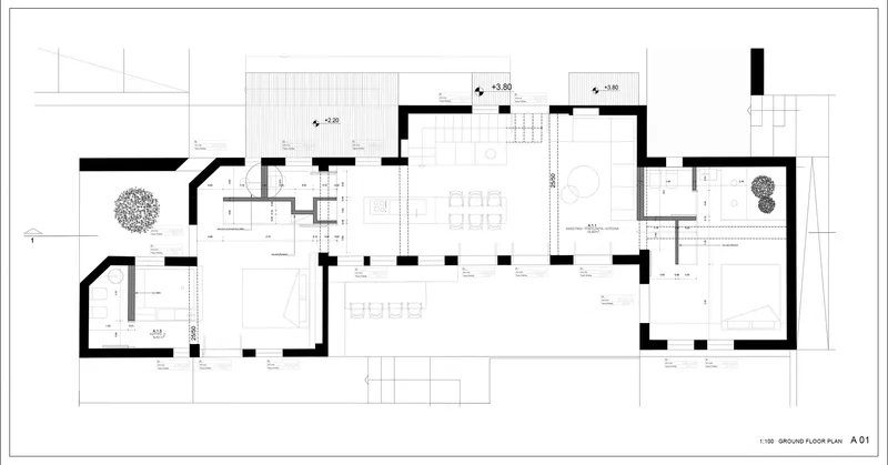 Ground floor plan drawing showing an open living and dining area with adjacent service spaces