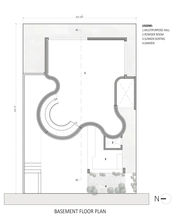 Basement floor plan drawing showing multipurpose hall with curving walls and adjacent garden