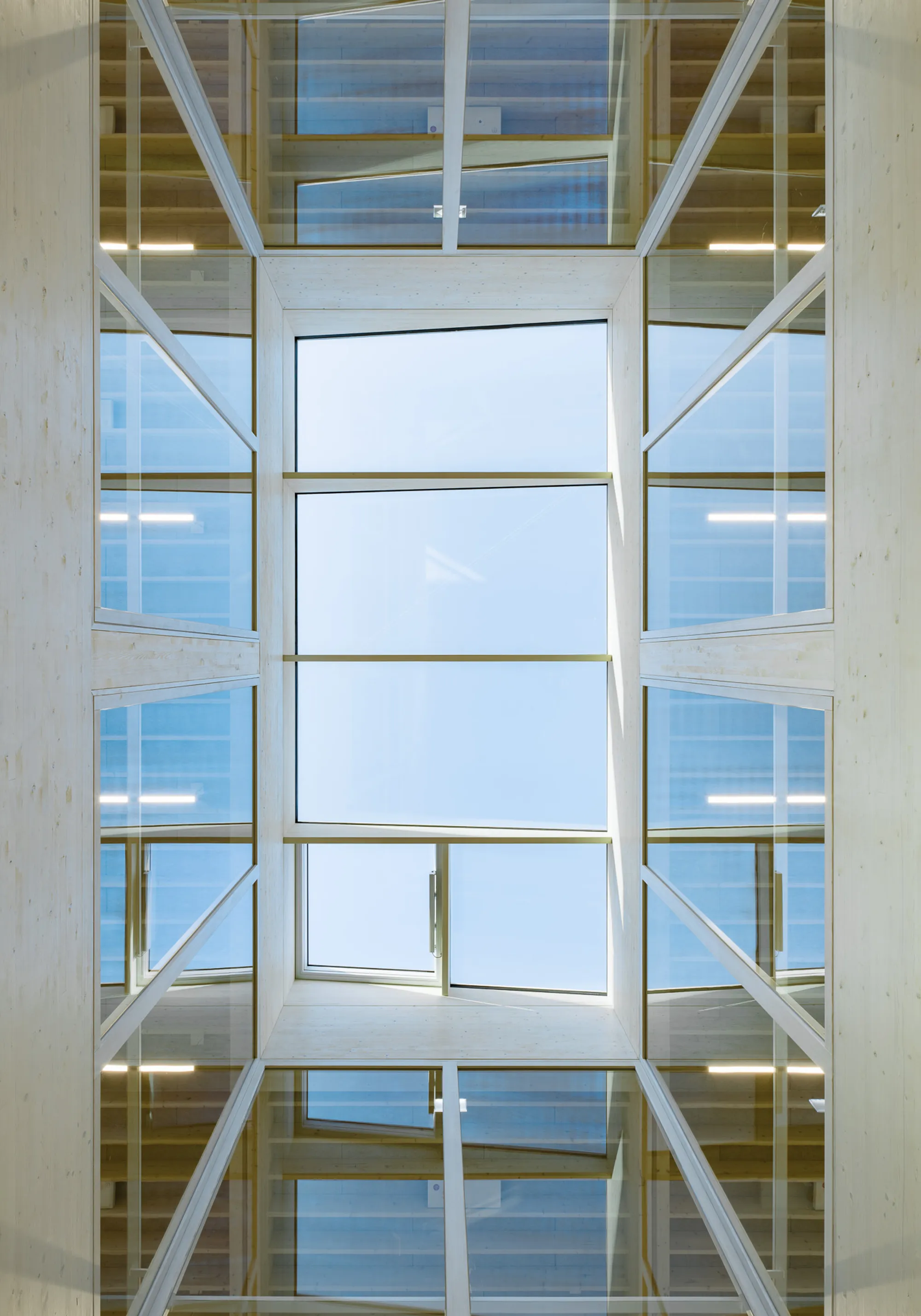 Waechter + Waechter Architekten Rotate a Timber Grid 45 Degrees to Build a Support Centre with No Front or Back