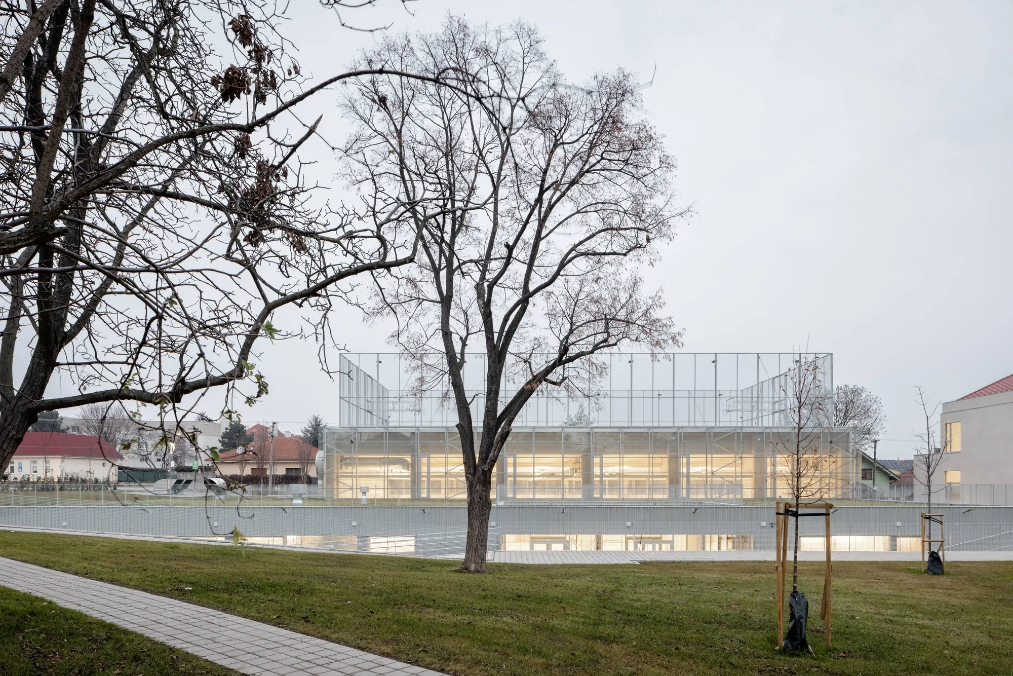 Bakyta Architekti Sinks a School and Sports Hall into a Slovak Village Without Disrupting It