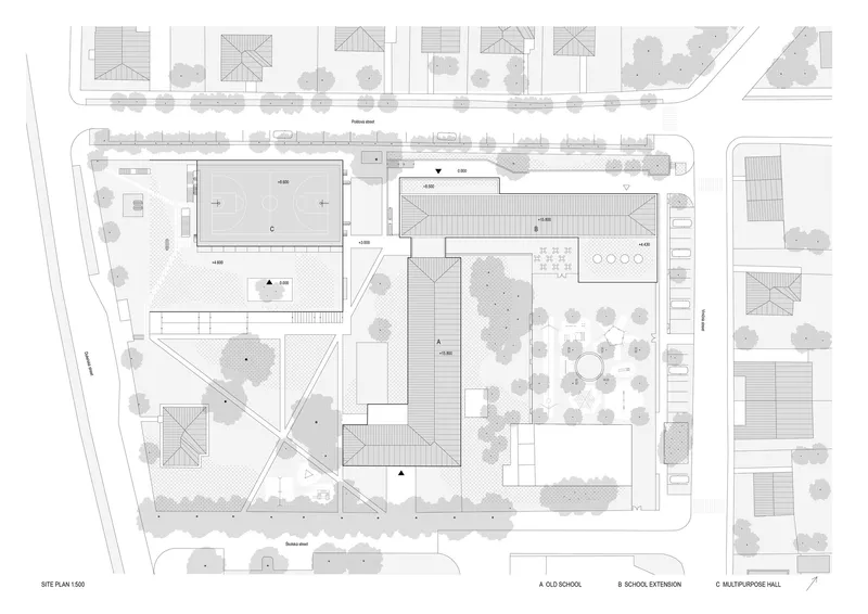 Site plan drawing showing a compound of buildings arranged around a central courtyard with trees