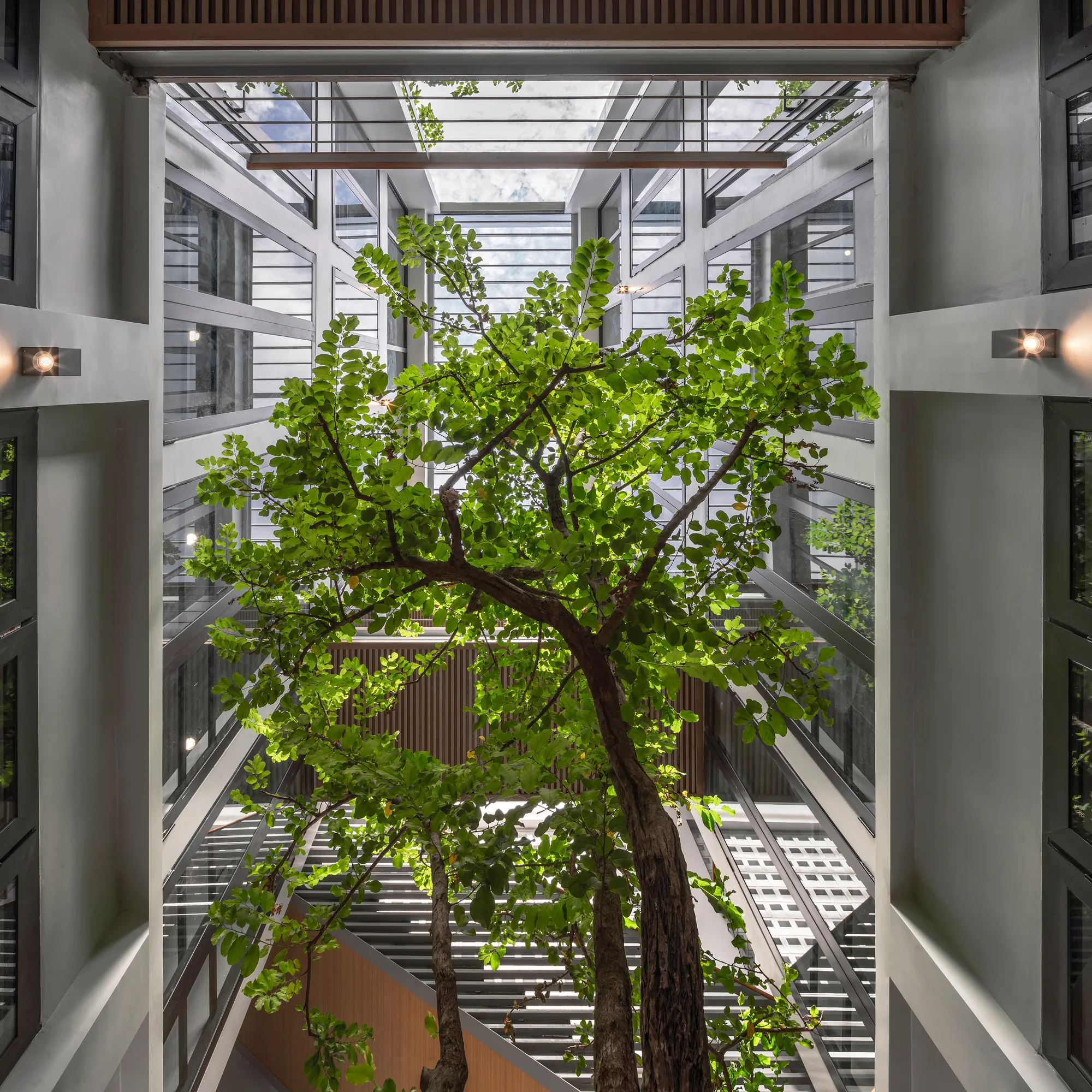 Silp Architects Carve Courtyards Through a Colonial Bangkok House to Build a Hybrid Home Office