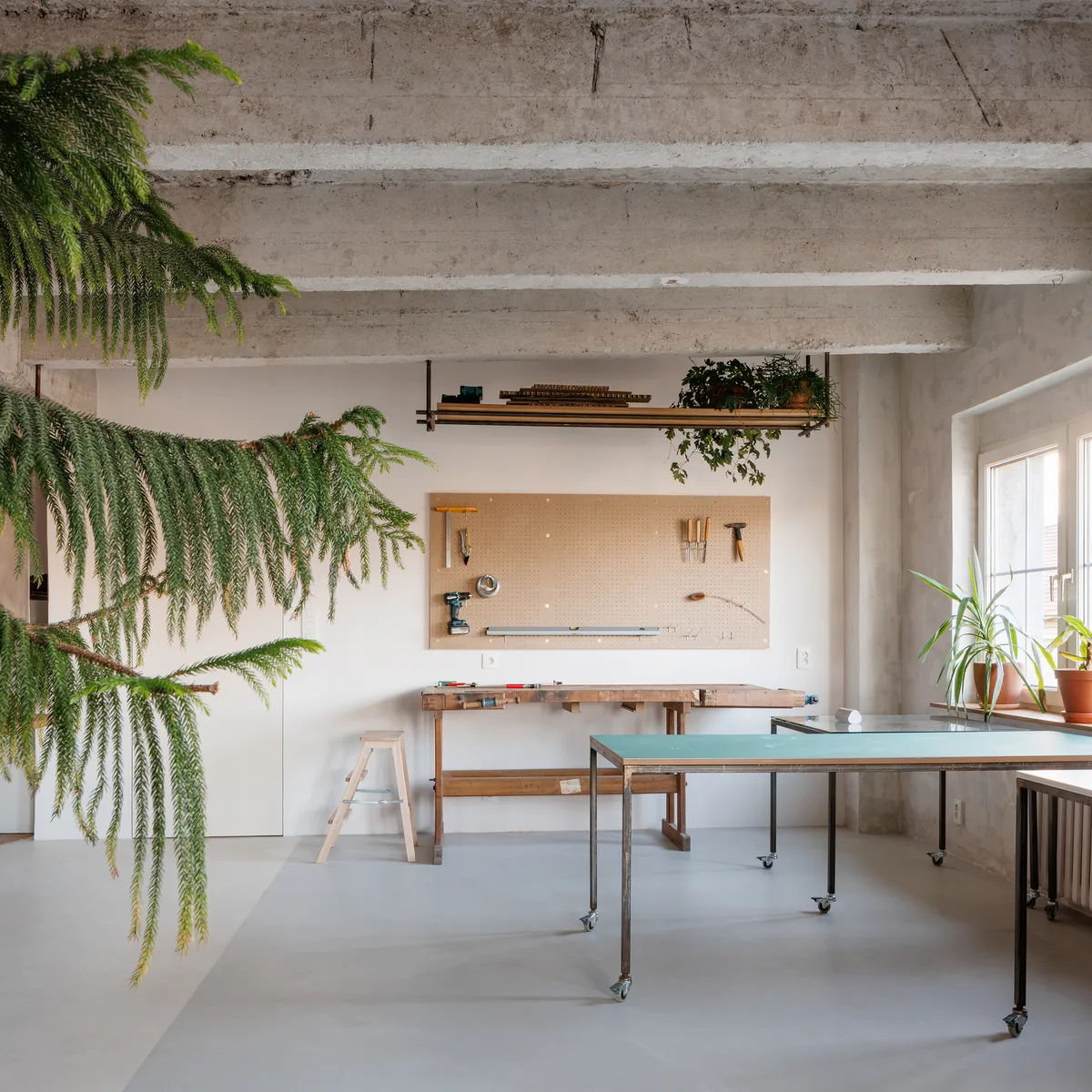 alchitekt Converts a Bratislava Apartment into a Workshop-Ready Creative Studio
