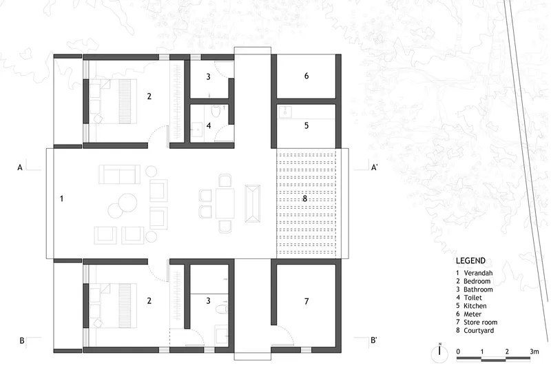 Floor plan drawing showing rooms arranged around a central open-air courtyard with surrounding landscaping
