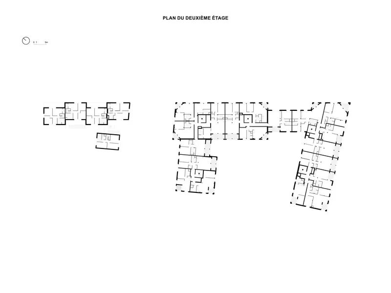 Second floor plan drawing displaying residential units organized in angular building volumes with corridors and staircases