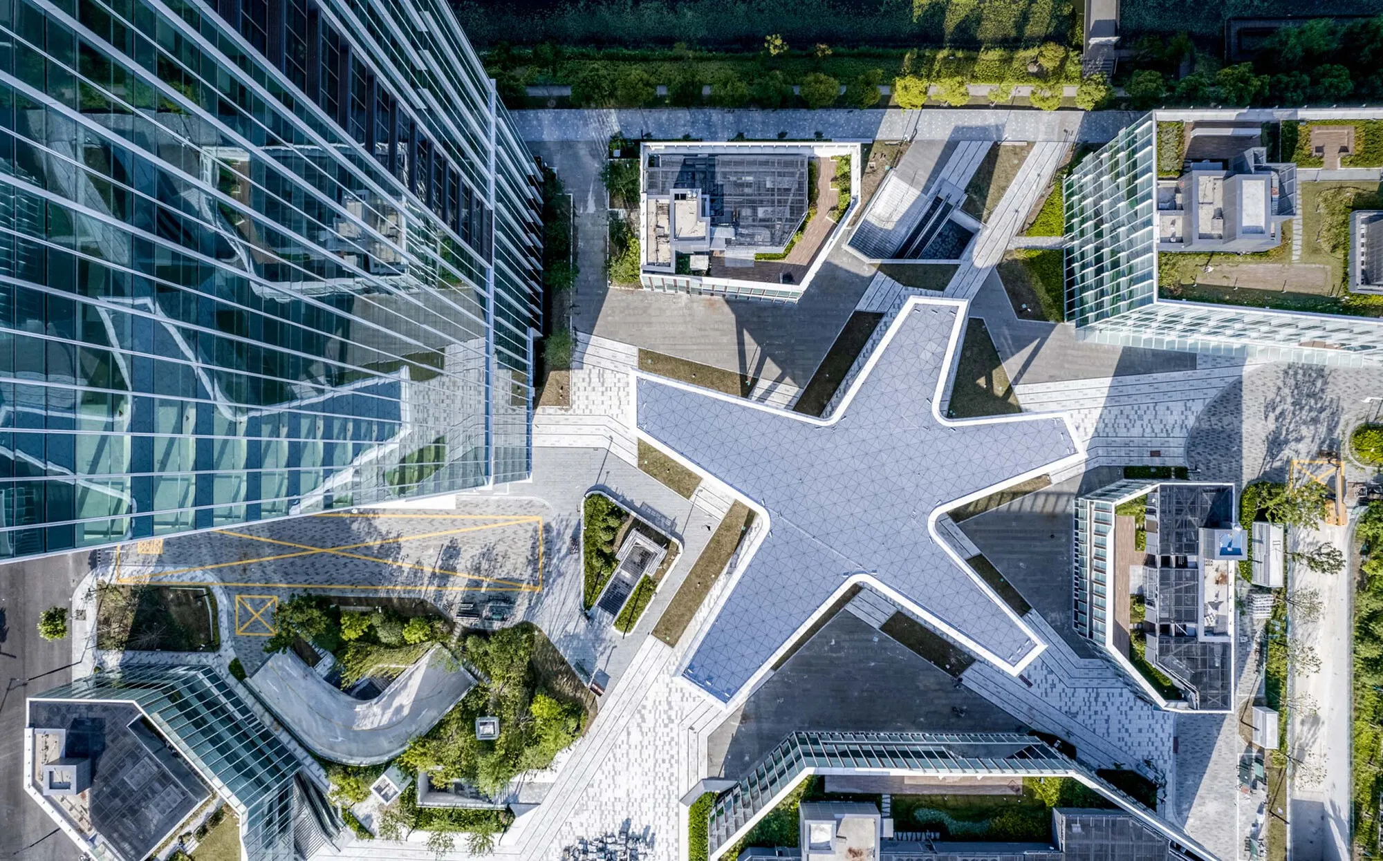 Gensler Anchors a Shanghai Riverside Campus Around a Star-Shaped Canopy
