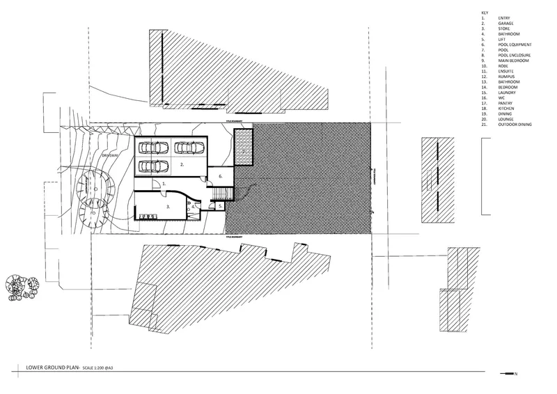 Lower ground plan drawing showing parking, pool area, and surrounding landscape with contour lines