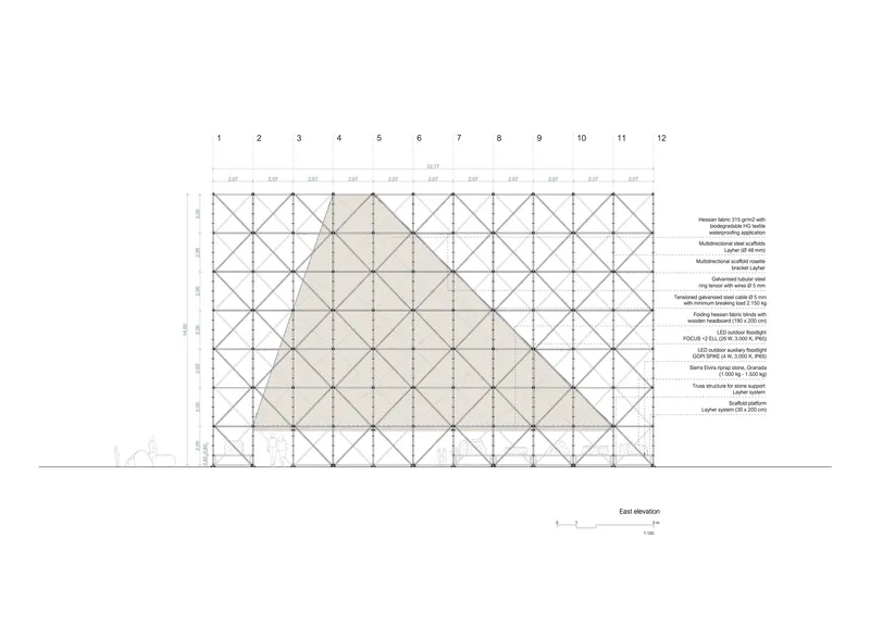 East elevation drawing showing a scaffolded facade with diagonal cross-bracing and material annotations