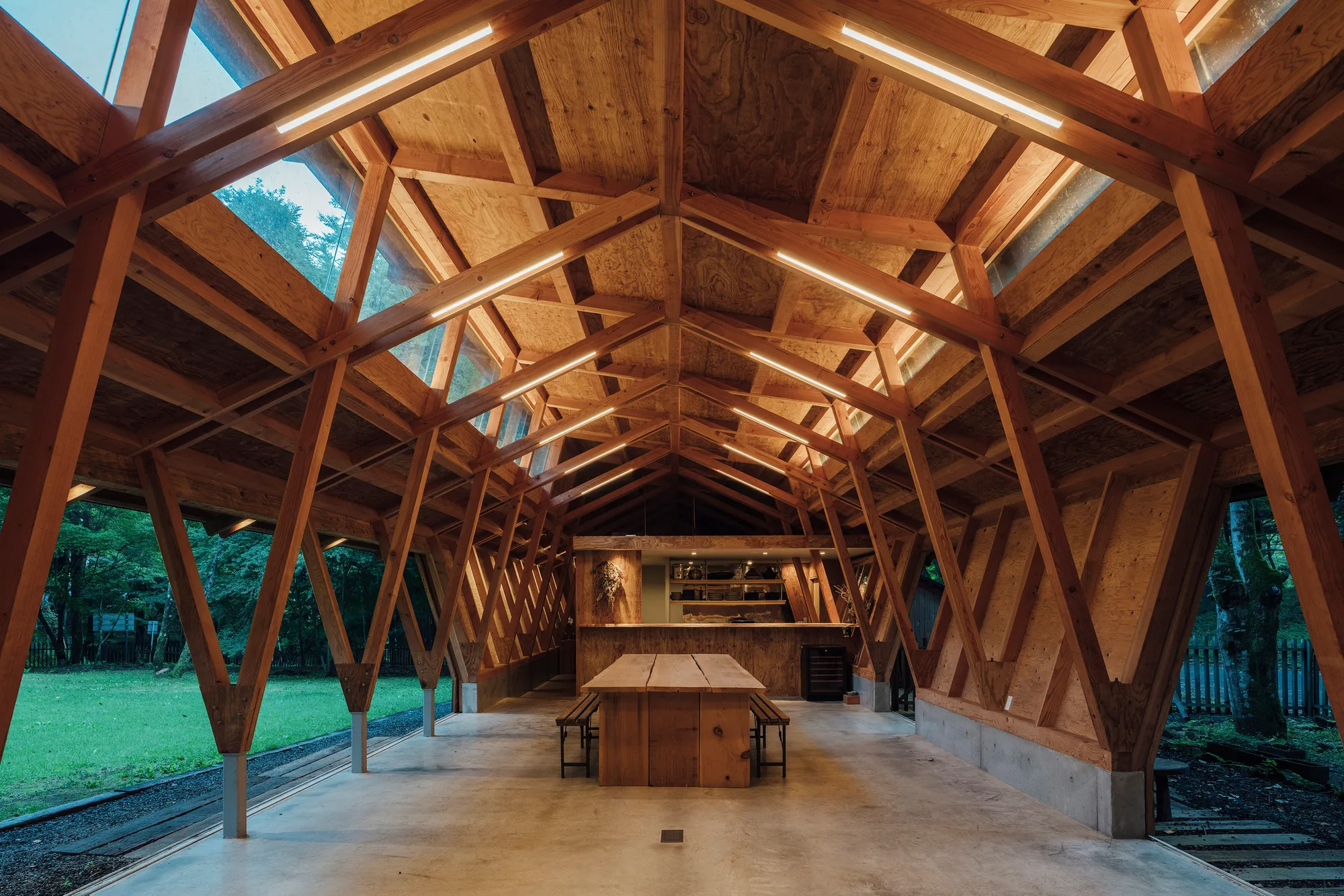Three Roofs Timber Hall by OOTT in Karuizawa