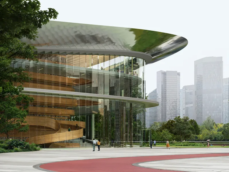 Glass curtain wall entrance with curving timber interior stairs visible beneath a sweeping reflective roof