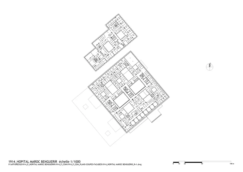 Floor plan drawing showing two connected building wings with central courtyards and modular room layouts