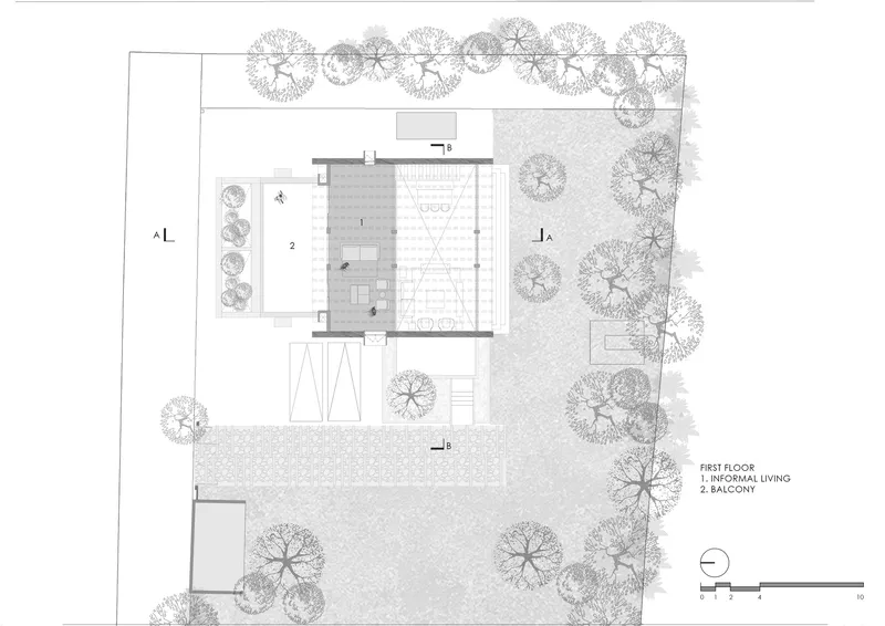 First floor plan drawing showing informal living area with balcony overlooking site