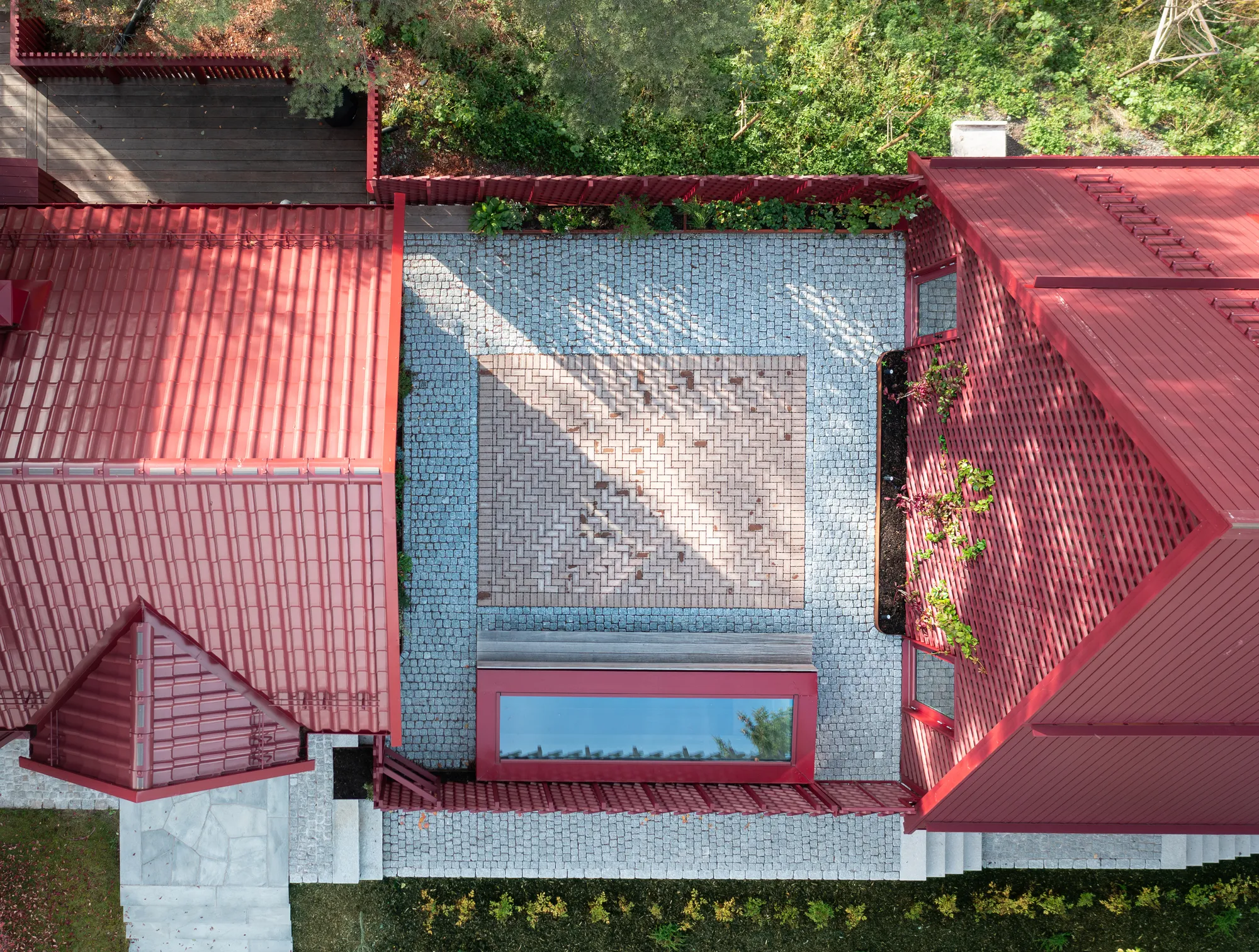 Rever and Drage Architects Turn One Red Norwegian House into Three