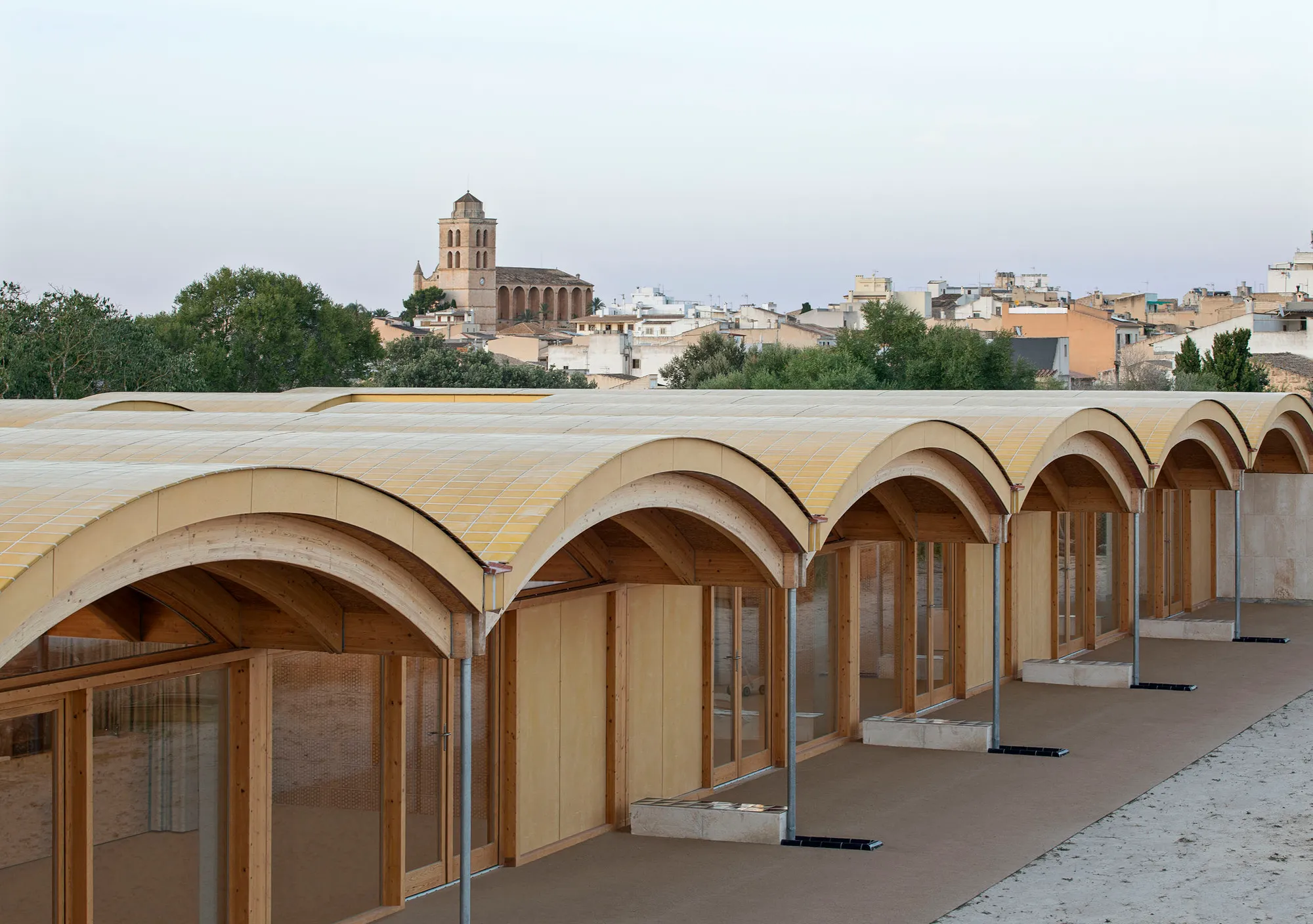 BOS Arquitectes Shelters a Mallorcan Nursery School Under Undulating Timber Vaults