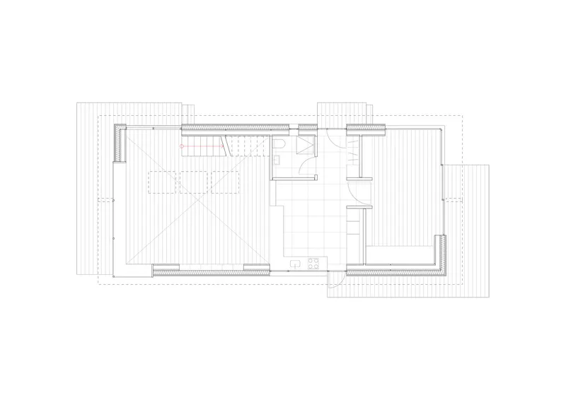 Floor plan drawing showing a compact unit with living area, kitchen, bathroom, and exterior deck