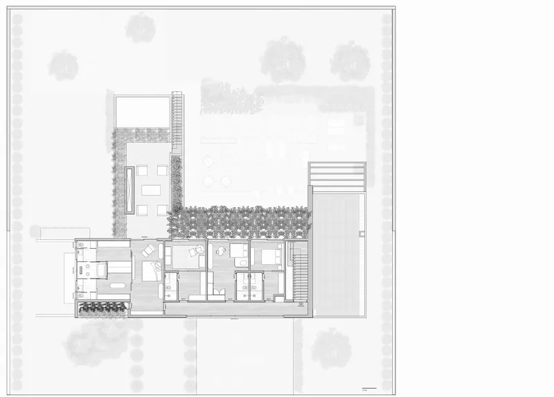 Floor plan drawing showing interior rooms adjacent to courtyard with planted buffer zone