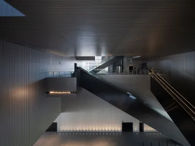 Katsuhiko Endo Floats a Black Museum Above Osaka's Nakanoshima Island Like a City Within a City