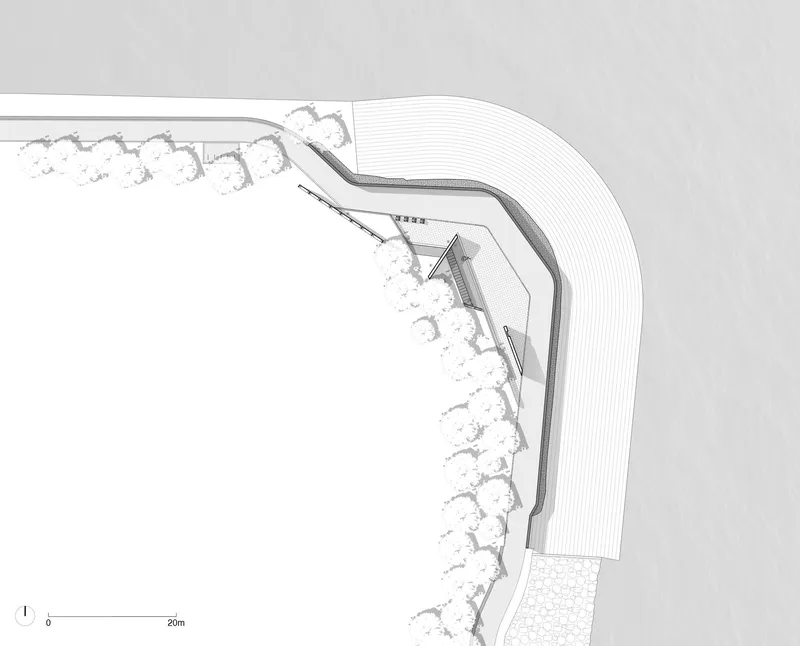 Plan drawing depicting an angular roof form wrapping around a central courtyard with surrounding trees